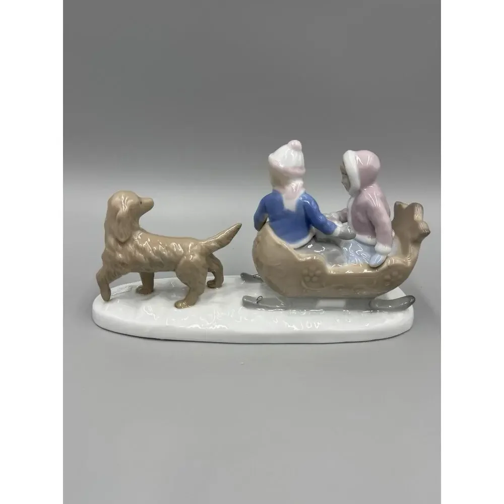 Meico Figurine Boy & Girl Sled Retriever Dog Snow Winter Porcelain Figurine 8”